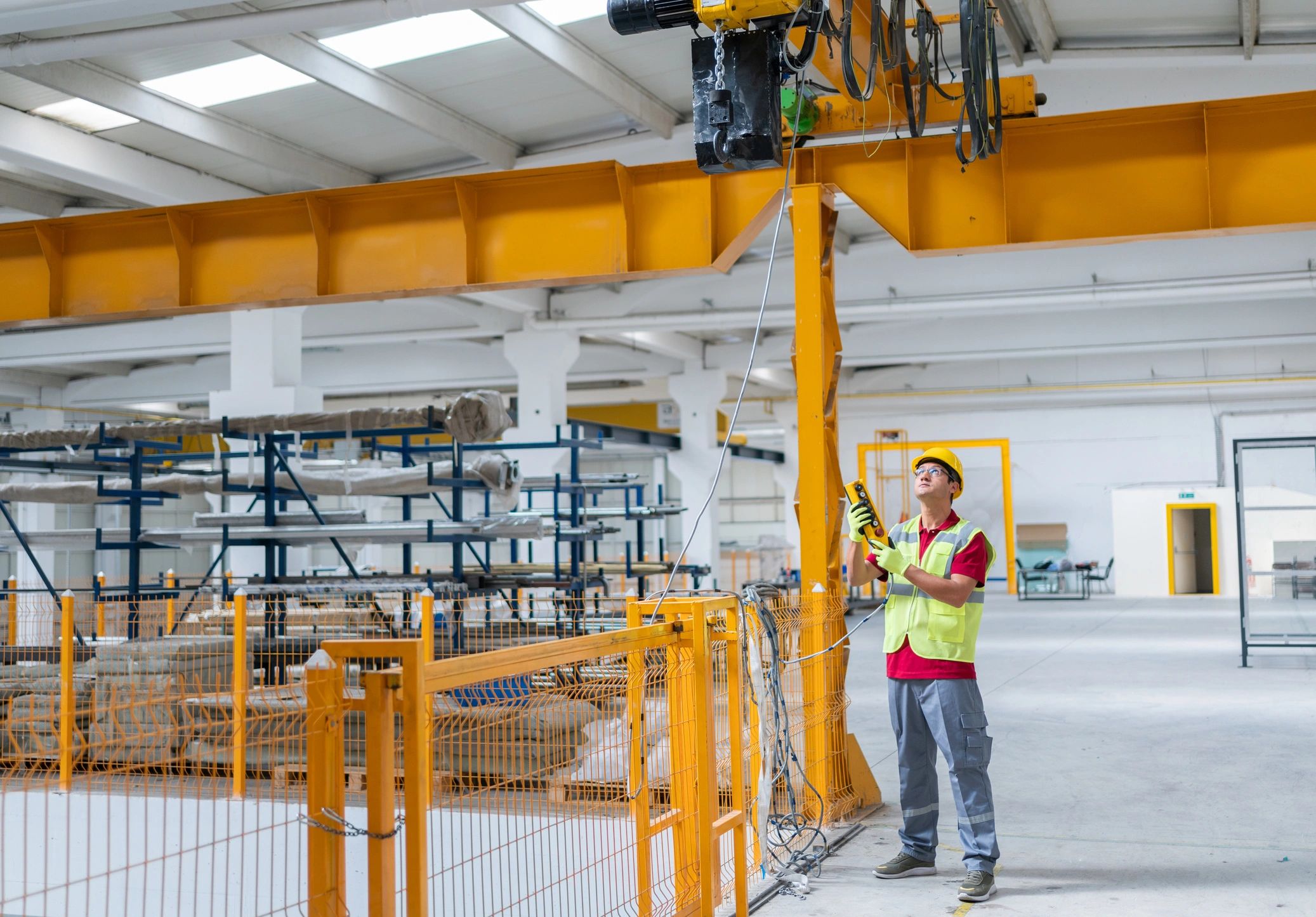 Factory crane operator at work
