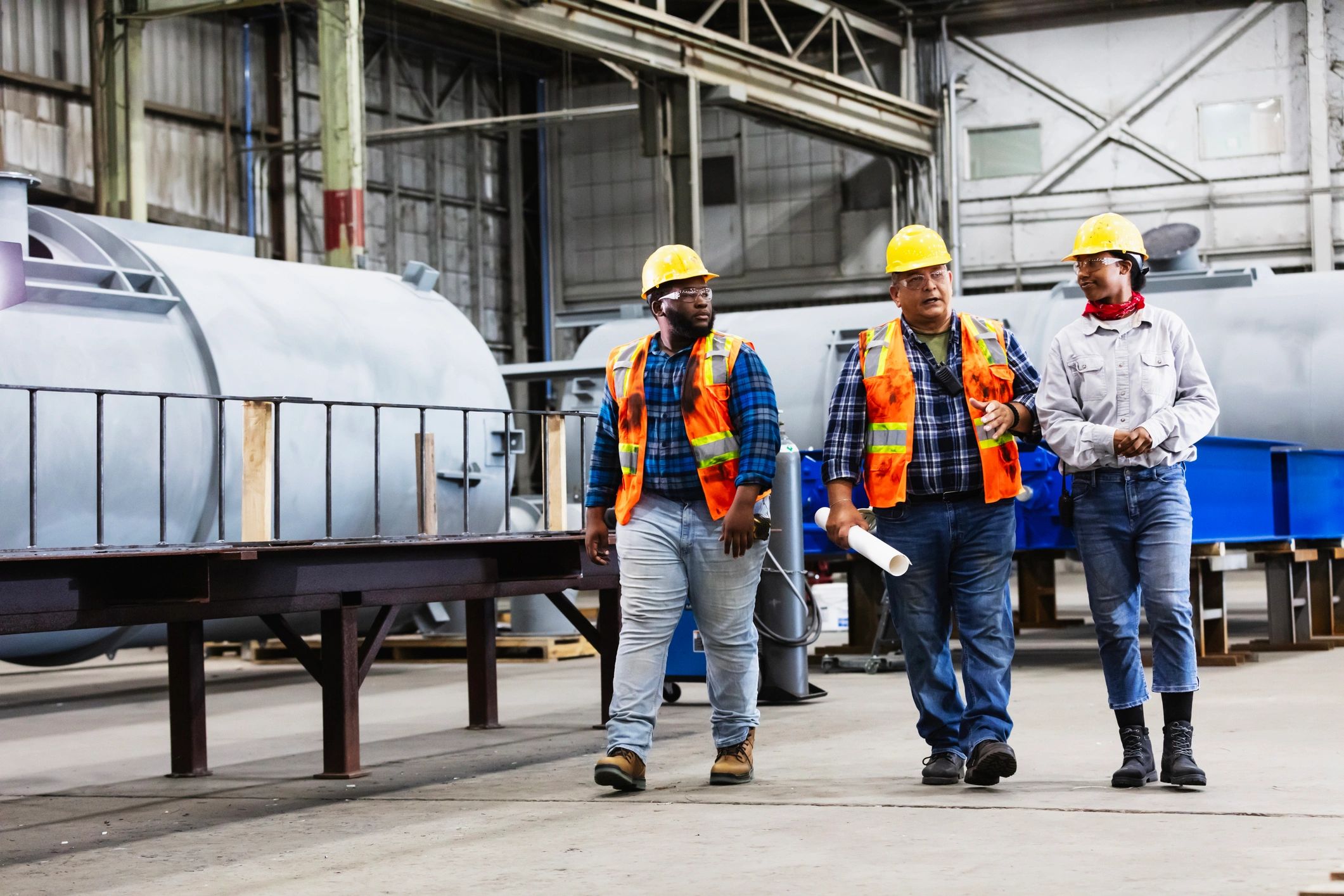 Team briefing in a fabrication facility